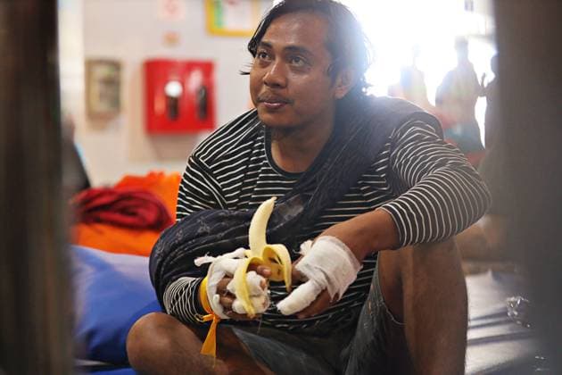 August 4, 2026, Surabaya, Indonesia: SURABAYA, EAST JAVA, INDONESIA †AUGUST 4, 2026: Survivors of the KM Mutiara Sentosa II ferry fire arrive at Tanjung Perak Port aboard the KM Masalembo in Surabaya, East Java, Indonesia, on August 4, 2026. Survivors described a chaotic evacuation, saying passengers received little or no guidance from the crew, searched for life jackets on their own, and some jumped into the sea before drifting for hours until they were rescued. Their accounts contrast with information provided by the ferry operator to the Indonesian National Search and Rescue Agency (BASARNAS), which stated that all 238 passengers were wearing life jackets during the evacuation. According to BASARNAS, 233 people survived and five - ZUMAq101 20260804_zna_q101_074 Copyright: xAndrexYurisx