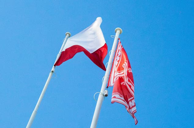 August 9, 2026, Warsaw, Mazovia, Poland: The flag of the Republic of Poland and the Jack of the President of the Republic of Poland are flown during the parade rehearsal. Early in the morning of 9th August, Poland s armed forces, and those of allies stationed in the country, take part in a rehearsal in preparation for a parade on National Armed Forces Day on the 15th August. Soldiers muster as the sun rises over the Vistula River and march past grandstands prepared for dignitaries. The soldiers were followed by mechanised divisions travelling in tanks and a variety of armoured vehicles. Afterwards, Secretary of State in the Ministry of Defence, Pawel Bejda addresses a post-rehearsal press conference, where he is accompanied by the Chief of - ZUMAs197 20260809_aaa_s197_067 Copyright: xNeilxMiltonx
