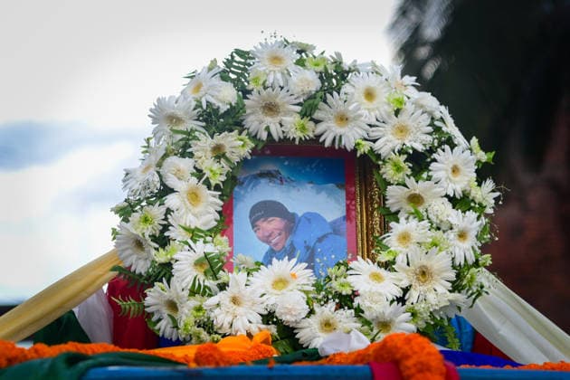 August 11, 2026, Kathmandu, Bagmati, Nepal: A photograph of Nepali mountaineer Kilu Pemba Sherpa is displayed with a garland as the remains of the three climbers are brought to Tribhuvan International Airport in Kathmandu, Nepal, on August 11, 2026, after being repatriated from Pakistan following the Broad Peak avalanche tragedy. Kilu Pemba Sherpa was among 10 members of an international expedition killed in an avalanche while ascending toward Camp 3 on Broad Peak (8,047 m) in Pakistanâ€⠢s Karakoram Range. The tragedy also claimed the lives of renowned British-Nepali mountaineer Nirmal â€oeNims†Purja, Pur Bahadur Gurung (Yukta), Nima Sherpa, Nawang Thindu Sherpa, Gyalu Sherpa, Wang Zhong of China, Nadhira Ahmed Abdullah Al Ha - ZUMAs330 20260811_zsp_s330_017 Copyright: xSafalxPrakashxShresthax