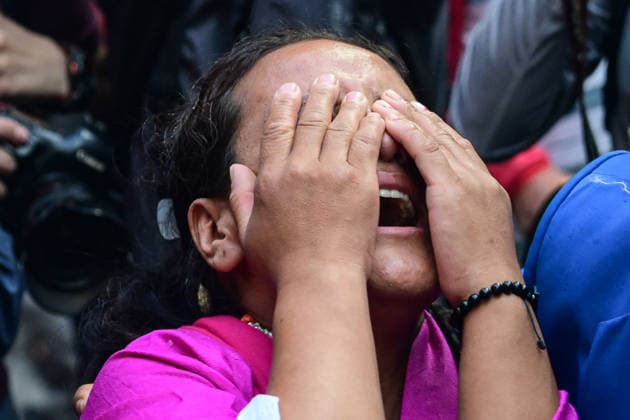 August 11, 2026, Kathmandu, Bagmati, Nepal: A relative of one of the Nepali mountaineers mourns as the remains of Kilu Pemba Sherpa (Kilu), Nima Sherpa, and Gyalu Sherpa are brought to Tribhuvan International Airport in Kathmandu, Nepal, on August 11, 2026, after being repatriated from Pakistan following the Broad Peak avalanche tragedy. The three climbers were among 10 members of an international expedition killed in an avalanche while ascending toward Camp 3 on Broad Peak (8,047 m) in Pakistanâ€⠢s Karakoram Range. The tragedy also claimed the lives of renowned British-Nepali mountaineer Nirmal(Nims)Purja, Pur Bahadur Gurung (Yukta), Nawang Thindu Sherpa, Wang Zhong of China, Nadhira Ahmed Abdullah Al Harthy of Oman, Sarah Mallory Gei - ZUMAs330 20260811_zsp_s330_019 Copyright: xSafalxPrakashxShresthax