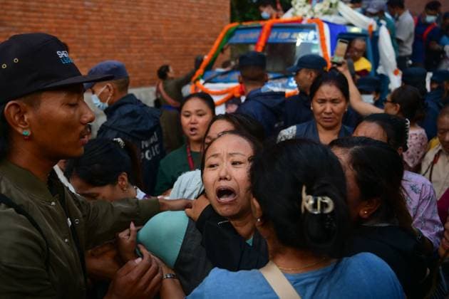 August 11, 2026, Kathmandu, Nepal: KATHMANDU, NEPAL †AUGUST 11, 2026: Relatives mourn at Tribhuvan International Airport as the remains of Nepali mountaineers Kilu Pemba Sherpa, Nima Sherpa and Gyalu Sherpa arrive in Kathmandu after being repatriated from Pakistan following the Broad Peak avalanche tragedy. The three climbers were among 10 members of an international expedition killed by an avalanche while ascending toward Camp 3 on Broad Peak, an 8,047-meter mountain in Pakistan s Karakoram Range. The tragedy also claimed the lives of renowned British-Nepali mountaineer Nirmal Nims Purja and climbers from China, Oman, the United States and Pakistan. Kathmandu Nepal - ZUMAq101 20260811_zna_q101_095 Copyright: xSafalxPrakashxShresthax