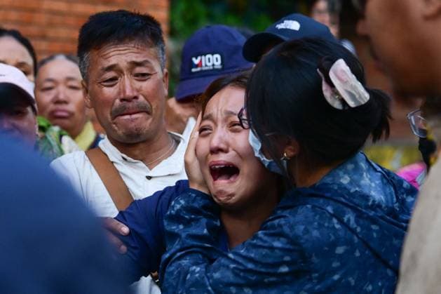 August 11, 2026, Kathmandu, Nepal: KATHMANDU, NEPAL †AUGUST 11, 2026: Relatives mourn at Tribhuvan International Airport as the remains of Nepali mountaineers Kilu Pemba Sherpa, Nima Sherpa and Gyalu Sherpa arrive in Kathmandu after being repatriated from Pakistan following the Broad Peak avalanche tragedy. The three climbers were among 10 members of an international expedition killed by an avalanche while ascending toward Camp 3 on Broad Peak, an 8,047-meter mountain in Pakistan s Karakoram Range. The tragedy also claimed the lives of renowned British-Nepali mountaineer Nirmal Nims Purja and climbers from China, Oman, the United States and Pakistan. Kathmandu Nepal - ZUMAq101 20260811_zna_q101_101 Copyright: xSafalxPrakashxShresthax