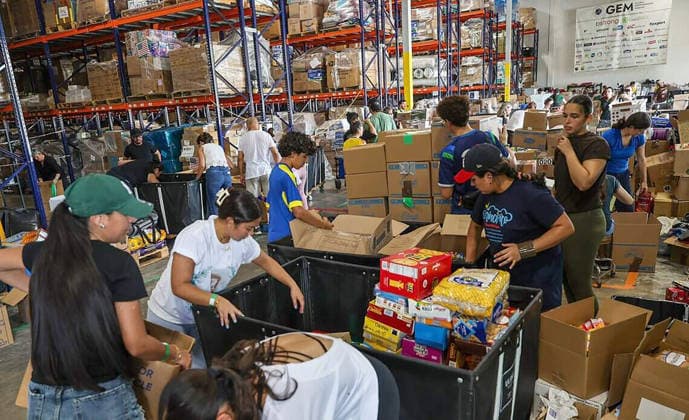 August 11, 2026, Fl, USA: Volunteers filled boxes with supplies of aid for the victims in Colombia, as a press conference held by Michael Capponi, founder of the Global Empowerment Mission (GEM), was taking place to detail the urgent relief operations and a call for local volunteers and the need of donations a day after the devastating 7.4-magnitude earthquake that struck western Colombia on Aug. 10, at the organizationâ€⠢s headquarters in Doral, Florida, on Tuesday, Aug. 11, 2026. USA - ZUMAm67_ 20260811_zaf_m67_003 Copyright: xPedroxPortalx
