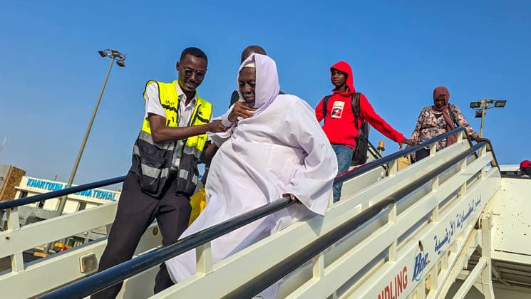 150 Sudanese return home from Kampala under voluntary return program KHARTOUM, SUDAN - AUGUST 16: Sudanese citizens disembark from a plane carrying 150 people from Kampala, Uganda, under a voluntary return program to Khartoum, Sudan, on August 16, 2026, as residents continue returning to the capital after the Sudanese army regained full control of the city on May 21, 2025, amid the ongoing economic and humanitarian crisis caused by the conflict that began between the army and the Rapid Support Forces (RSF) on April 15, 2023. Nezar Abdallah Basheer Anadolu Khartoum Sudan. Editorial use only. Please get in touch for any other usage. Copyright: x2026xAnadoluxNezarxAbdallahxBasheerx
