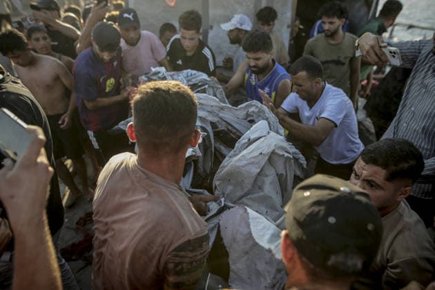 Israeli drone strike on crowded Gaza cafe kills 6 Palestinians GAZA CITY, GAZA, PALESTINE - AUGUST 18: Palestinians carry bodies following an Israeli airstrike on beachfront cafe that killed at least six people, including a child, and injured more than 12 others in Gaza City, Gaza, Palestine on August 18, 2026, following an Israeli airstrike that killed at least six people, including a child, and injured more than 12 others. The attack on the civilian gathering spot occurred despite recent calls from U.S. President Donald Trump urging Israel to halt its military operations across the Gaza Strip, as local rescue teams worked to retrieve victims from the damaged structure. Saeed M. M. T. Jaras Anadolu Gaza City Gaza. Editorial use only. Ple Copyright: x2026xAnadoluxSaeedxM.xM.xT.xJarasx
