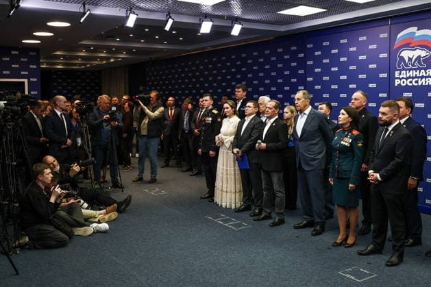 RUSSIA, MOSCOW - SEPTEMBER 20, 2026: VGTRK war correspondent Yevgeny Poddubny, Hero of Russia, nurse Lyudmila Bolilaya, Russia’s Minister of Foreign Affairs Sergei Lavrov, United Russia Party Chairman, Russian Security Council Deputy Chairman Dmitry Medvedev, United Russia General Council Secretary, Russian Federation Council First Deputy Speaker Vladimir Yakushev, Russia’s Children’s Rights Commissioner Maria Lvova-Belova, and Hero of Russia, Yunarmia Main Office Head Vladislav Golovin (from L to R front) are seen at the United Russia Party s Central Executive Committee office during a meeting to discuss preliminary results of the 2026 Russian State Duma election. During the 2026 Single Voting Day, which lasted from 18 to 20 September, Rus 98040868