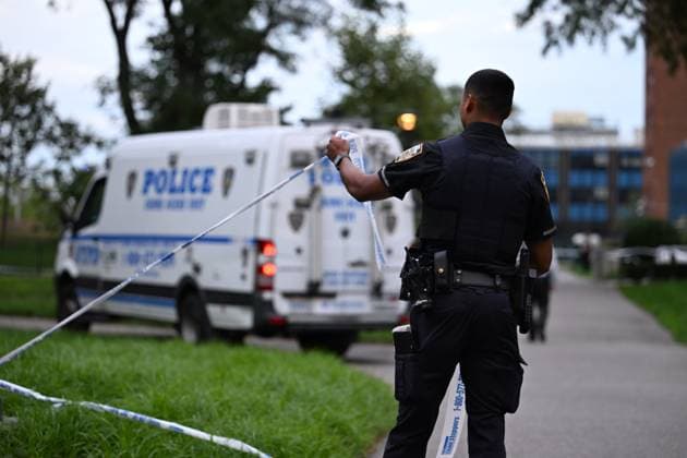 September 21, 2026, Far Rockaway, Queens, New York, USA: NYPD officers work the scene where a 14-year-old boy was shot at 430 Beach 54 Street in Far Rockaway, Queens, New York, United States on Monday, September 21, 2026. The shooting happened after 3:30 pm and the victim was transported to LI Jewish Hospital Cohen and was originally listed in critical condition. A scooter and shell casings were found at the scene. There are no arrests and the investigation is ongoing by the NYPD. Far Rockaway, Queens USA - ZUMAs197 20260921_aaa_s197_101 Copyright: xKylexMazzax