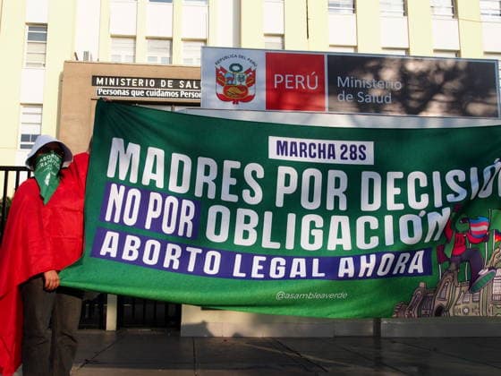 September 26, 2026, Lima, Lima, Peru: Mothers by choice, not by obligation reads a banner when on International Safe Abortion Day hundreds of women, wearing green scarf, carry out a demonstration demanding legal, safe, and free abortion in Peru, as part of the comprehensive health of girls, adolescents, women, and anyone with the possibility of gestating. Abortion in Peru, a conservative country, is illegal and punishable Lima Peru - ZUMAg240 20260926_zip_g240_020 Copyright: xCarlosxGarciaxGranthonx