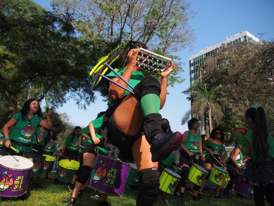 September 26, 2026, Lima, Lima, Peru: Woman playing a tambourine when on International Safe Abortion Day hundreds of women, wearing green scarf, carry out a demonstration demanding legal, safe, and free abortion in Peru, as part of the comprehensive health of girls, adolescents, women, and anyone with the possibility of gestating. Abortion in Peru, a conservative country, is illegal and punishable Lima Peru - ZUMAg240 20260926_zip_g240_007 Copyright: xCarlosxGarciaxGranthonx