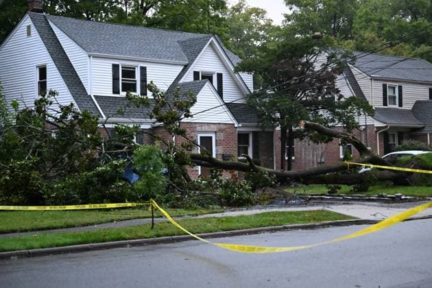 September 27, 2026, Ridgewood, New Jersey, USA: A tree is seen uprooted with wires down outside of a home on Gilbert Street during a nor easter storm in Ridgewood, New Jersey, United States, on Sunday, September 27, 2026. Heavy rain and strong winds battered the northeastern United States as an unusually powerful autumn storm intensified, forcing the cancellation of hundreds of flights and leaving tens of thousands of people without power. New York, Boston and Philadelphia were among the areas affected by the storm, as authorities warned of potential major flooding and road closures. Ridgewood USA - ZUMAs197 20260927_aaa_s197_013 Copyright: xKylexMazzax