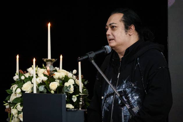 RUSSIA, MOSCOW - SEPTEMBER 30, 2026: Singer Igor Nadzhiyev speaks at a farewell ceremony for music critic Sergei Sosedov at Troyekurovskoye Cemetery. Sosedov died in an accident in the Republic of Sakha (Yakutia) on September 23, at the age of 59. Artyom Geodakyan TASS 98561882