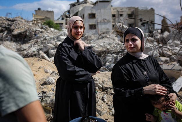 Palestinians Hold Mass Funeral for 105 Recovered from Gaza Rubble Palestinians take part in a mass funeral for 105 Palestinians whose remains were recovered from beneath the rubble of destroyed buildings in the al-Taj area of Gaza City’s al-Yarmouk neighborhood on October 1, 2026. The victims, including women and children, were killed in Israeli airstrikes during the early stages of the war, with families gathering for their funeral and burial after their remains had been trapped under the rubble for years. Photo by Bilal Osama apaimages Gaza city Gaza Strip Palestinian Territory 011026_Gaza_BO_00(34) Copyright: xapaimagesxBilalxOsamax xapaimagesx