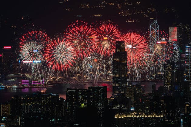 HONG KONG-DAILY NATIONAL-DAY A panoramic general view captured from Kowloon Peak (Fei Ngo Shan) shows fireworks illuminating the night sky above Victoria Harbour during the 77th National Day celebration on October 1, 2026 in Hong Kong, overlooking the expansive cityscapes of the southern Kowloon Peninsula and the illuminated skyline of northern Hong Kong Island. (Photo by Kevin Li TMHK via Nexpher Images) Hong Kong