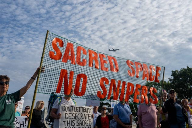 October 1, 2026, Washington, Dc, USA: Protesters opposed to President Trumpâ€⠢s proposed arch rally outside of Arlington Cemetery on October 1, 2026. Washington USA - ZUMAl312 20261001_znp_l312_026 Copyright: xAndrewxLeydenx