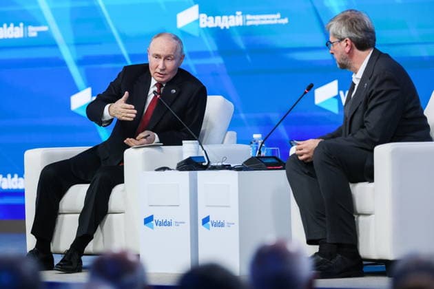 RUSSIA, MOSCOW REGION - OCTOBER 1, 2026: Russia s President Vladimir Putin (L) and Research Director of the Foundation for Development and Support of the Valdai Discussion Club, Editor-in-Chief of the Russia in Global Affairs Journal, Fyodor Lukyanov are seen during a plenary session titled Responsibility for the Future: Limits of the Possible or Possibilities Without Limit? at the 23th annual meeting of the Valdai Discussion Club in Istra Russia - ZUMAt113 20261001_zaa_t113_356 Copyright: xAlexanderxShcherbakx