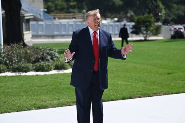 October 1, 2026, Washington, Dc, USA: U.S. President Donald Trump talks to the media before boarding Marine One on the South Lawn of the White House in Washington, DC, United States, on October 1, 2026. President Trump heads to Texas to visit Peterbilt Motors in Denton to highlight manufacturing and his economic agenda. Washington USA - ZUMAs197 20261001_aaa_s197_190 Copyright: xKylexMazzax