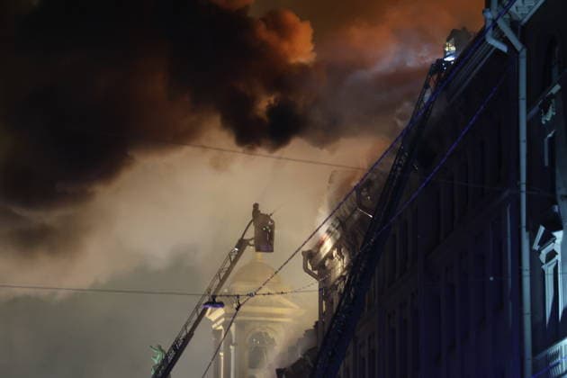 RUSSIA, ST PETERSBURG - OCTOBER 1, 2026: Fire crews battle a fire at the Miller Manions in St Isaac s Square. Valentin Yegorshin TASS 98637812