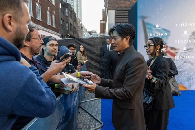 October 1, 2026, London, United Kingdom: Genden Phuntsok signs autographs with fans at the Gala Screening of TENZING at Curzon Mayfair, London.Cast and Guests attend the red carpet for the London Gala Screening of TENZING at Curzon Mayfair London United Kingdom - ZUMAs197 20261001_aaa_s197_290 Copyright: xPhilxLewisx