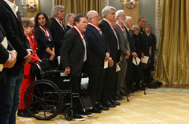 October 2, 2026, Ottawa, On, CANADA: Actor Michael J. Fox, front, stands for the national anthem with other Order of Canada recipients at the end of an investiture ceremony at Rideau Hall in Ottawa, Friday, Oct. 2, 2026. Ottawa CANADA - ZUMAc35_ 20261002_zaf_c35_081 Copyright: xPatrickxDoylex