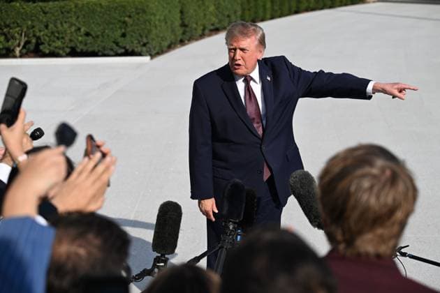 October 2, 2026, Washington, Dc, USA: U.S. President Donald Trump talks to the media before boarding Marine One on the South Lawn of the White House in Washington, DC, United States, on October 2, 2026. Washington USA - ZUMAs197 20261002_aaa_s197_265 Copyright: xKylexMazzax