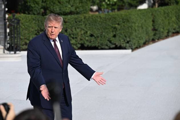 October 2, 2026, Washington, Dc, USA: U.S. President Donald Trump talks to the media before boarding Marine One on the South Lawn of the White House in Washington, DC, United States, on October 2, 2026. Washington USA - ZUMAs197 20261002_aaa_s197_285 Copyright: xKylexMazzax