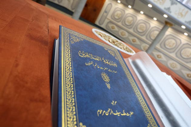 Open Mosque Day in Germany Open Mosque Day in Germany. A book with arabic written is seen in the mosque Bait ur Rehman Moschee in Nuremberg, Germany . October 03rd , 2026 Photo by Davide Elias Copyright: xDavidexEliasx