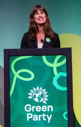 October 3, 2026, Brighton, United Kingdom: Green Party Deputy Leader, Rachel Millward seen addressing the Brighton Centre during the Green Party Autumn Conference. Millward used her address on the main stage to highlight the party s surge in membership, while outlining alternative policies on public services, energy infrastructure, and green housing solutions. Brighton United Kingdom - ZUMAs197 20261003_aaa_s197_011 Copyright: xGaryxRobertsx