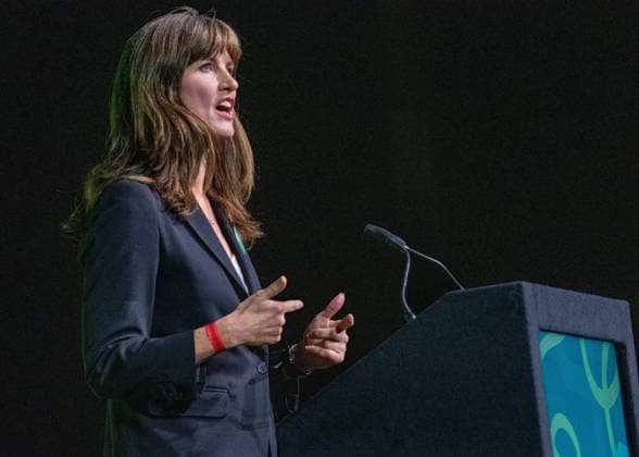 October 3, 2026, Brighton, United Kingdom: Green Party Deputy Leader, Rachel Millward seen addressing the Brighton Centre during the Green Party Autumn Conference. Millward used her address on the main stage to highlight the party s surge in membership, while outlining alternative policies on public services, energy infrastructure, and green housing solutions. Brighton United Kingdom - ZUMAs197 20261003_aaa_s197_012 Copyright: xGaryxRobertsx