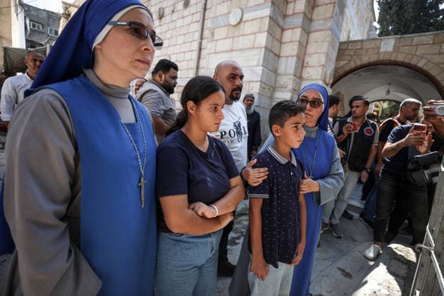 Funeral ceremony for two Palestinian Christians after an Israeli attack in Gaza GAZA CITY, PALESTINE - OCTOBER 03 : Poeple gather during the funeral ceremony for two Palestinian Christian women at the St. Porphyrios Greek Orthodox Church in Gaza City, Palestine on October 03, 2026. Meysa Hidir Ibrahim Abu Dawud and her daughter Marya Hafiz Michel Najjar were killed after an Israeli airstrike. Ali Jadallah Anadolu Gaza City Gaza. Editorial use only. Please get in touch for any other usage. Copyright: x2026xAnadoluxAlixJadallahx