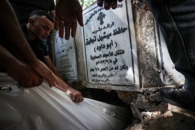 Funeral ceremony for two Palestinian Christians after an Israeli attack in Gaza GAZA CITY, PALESTINE - OCTOBER 03 : Poeple gather during the funeral ceremony for two Palestinian Christian women at the St. Porphyrios Greek Orthodox Church in Gaza City, Palestine on October 03, 2026. Meysa Hidir Ibrahim Abu Dawud and her daughter Marya Hafiz Michel Najjar were killed after an Israeli airstrike. Ali Jadallah Anadolu Gaza City Gaza. Editorial use only. Please get in touch for any other usage. Copyright: x2026xAnadoluxAlixJadallahx