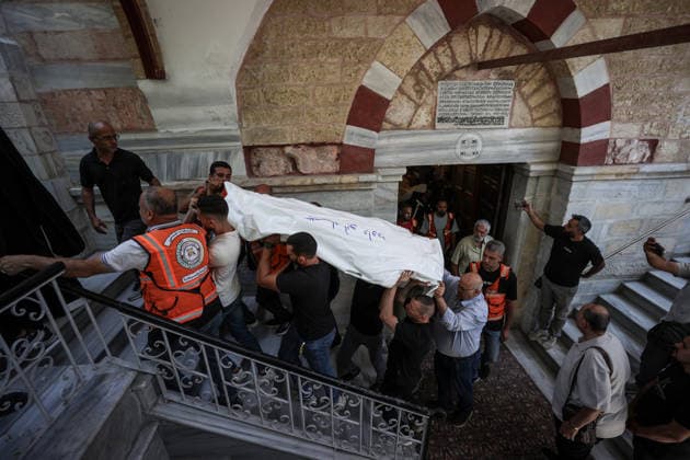 Funeral ceremony for two Palestinian Christians after an Israeli attack in Gaza GAZA CITY, PALESTINE - OCTOBER 03 : Poeple gather during the funeral ceremony for two Palestinian Christian women at the St. Porphyrios Greek Orthodox Church in Gaza City, Palestine on October 03, 2026. Meysa Hidir Ibrahim Abu Dawud and her daughter Marya Hafiz Michel Najjar were killed after an Israeli airstrike. Ali Jadallah Anadolu Gaza City Gaza. Editorial use only. Please get in touch for any other usage. Copyright: x2026xAnadoluxAlixJadallahx