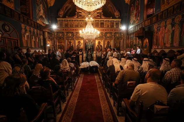 Funeral ceremony for two Palestinian Christians after an Israeli attack in Gaza GAZA CITY, PALESTINE - OCTOBER 03 : Poeple gather during the funeral ceremony for two Palestinian Christian women at the St. Porphyrios Greek Orthodox Church in Gaza City, Palestine on October 03, 2026. Meysa Hidir Ibrahim Abu Dawud and her daughter Marya Hafiz Michel Najjar were killed after an Israeli airstrike. Ali Jadallah Anadolu Gaza City Gaza. Editorial use only. Please get in touch for any other usage. Copyright: x2026xAnadoluxAlixJadallahx