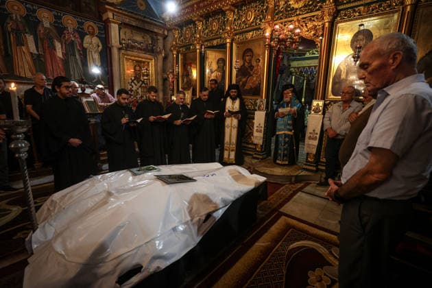 Funeral ceremony for two Palestinian Christians after an Israeli attack in Gaza GAZA CITY, PALESTINE - OCTOBER 03 : Poeple gather during the funeral ceremony for two Palestinian Christian women at the St. Porphyrios Greek Orthodox Church in Gaza City, Palestine on October 03, 2026. Meysa Hidir Ibrahim Abu Dawud and her daughter Marya Hafiz Michel Najjar were killed after an Israeli airstrike. Ali Jadallah Anadolu Gaza City Gaza. Editorial use only. Please get in touch for any other usage. Copyright: x2026xAnadoluxAlixJadallahx