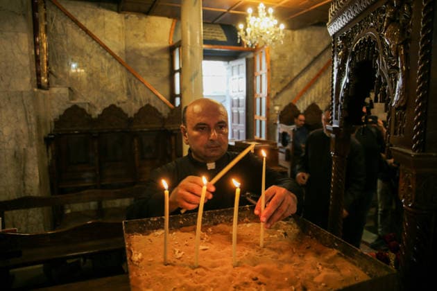 October 3, 2026, Gaza City, Gaza Strip, Palestinian Territory: Palestinian Christians gather to bid farewell and pray beside the bodies of Maysaa Abu Daoud and her daughter, Mary Abu Daoud, who were killed in an Israeli airstrike that targeted a residential apartment in western Gaza City. Funeral prayers are held at St. Porphyrios Church in the Zeitoun neighborhood of southeastern Gaza City. Gaza City Palestinian Territory - ZUMAz119 20261003_zip_z119_049 Copyright: xSalahxHashemx