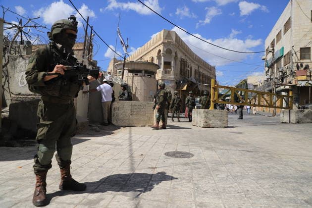 Israeli forces raid Hebron on Sukkot holiday HEBRON, WEST BANK, PALESTINE - OCTOBER 03: Israeli soldiers restrict the movement of Palestinians and take security measures as they raid the Old Town on the occasion of Sukkot feast in Hebron, West Bank, Palestine on October 03, 2026. Amer Shallodi Anadolu Hebron West Bank. Editorial use only. Please get in touch for any other usage. Copyright: x2026xAnadoluxAmerxShallodix