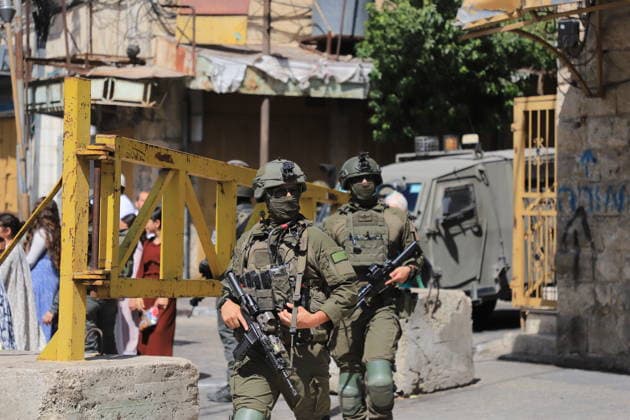 Israeli forces raid Hebron on Sukkot holiday HEBRON, WEST BANK, PALESTINE - OCTOBER 03: Israeli soldiers restrict the movement of Palestinians and take security measures as they raid the Old Town on the occasion of Sukkot feast in Hebron, West Bank, Palestine on October 03, 2026. Amer Shallodi Anadolu Hebron West Bank. Editorial use only. Please get in touch for any other usage. Copyright: x2026xAnadoluxAmerxShallodix