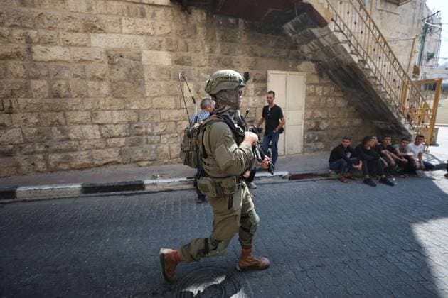 October 4, 2026, Hebron, Palestine, State of: HEBRON, OCCUPIED WEST BANK, OCTOBER 4, 2026: Newly installed Israeli military gates are seen near entrances to Hebron s Old City as Israeli forces impose additional movement restrictions in the area. One of the new iron gates was installed in the Al-Zahid area, a key route connecting neighborhoods of the Old City and providing access toward the Ibrahimi Mosque. Local shop owner Badr al-Tamimi said the restrictions were affecting access to more than 1,000 commercial shops and over 500 homes in the area. Hebron Palestine, State of - ZUMAq101 20261004_zna_q101_060 Copyright: xMosabxShawerx