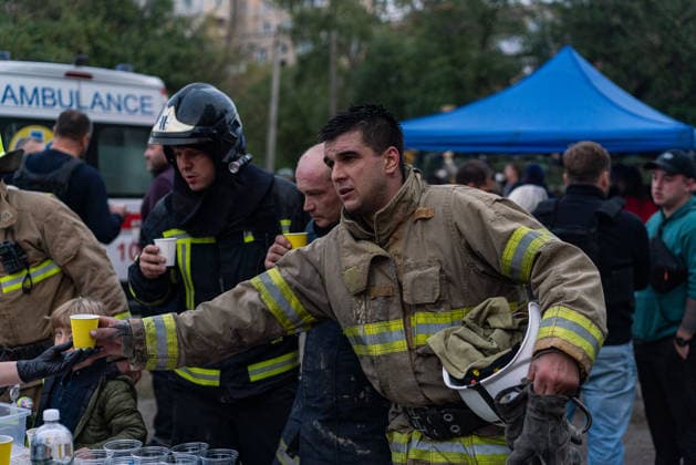 Russian missile attack on Ukraine s Kharkiv KHARKIV, UKRAINE - OCTOBER 5: Firefighters and emergency service workers operate at the site of a residential building struck by a guided bomb in Kharkiv, Ukraine on October 5, 2026. A guided bomb hit a residential building, killing at least two people and injuring over 30 others. The strike destroyed several parked vehicles and damaged more than 40 surrounding houses, with search, rescue, and cleanup operations ongoing by police, firefighters, and volunteers. Carlo Bravo Anadolu Kharkiv Ukraine. Editorial use only. Please get in touch for any other usage. Copyright: x2026xAnadoluxCarloxBravox