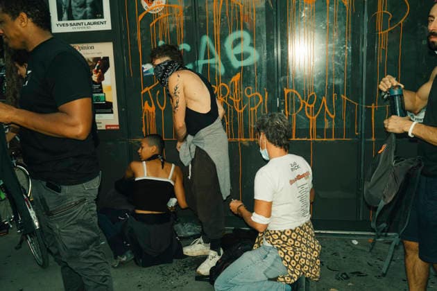 Paris Students Protest Education Conditions Demonstrators sit on a pavement beside a graffiti-covered metal shutter in Paris, France, on October 6, 2026. France s Interior Ministry said 256,000 people marched nationwide, including 56,000 in Paris, during the student-led day of action over school conditions. High school students called for more education funding and staff, smaller classes and improved facilities, with teachers, parents and unions joining demonstrations. Paris Ile de France France Copyright: xDavoodxMaeilix