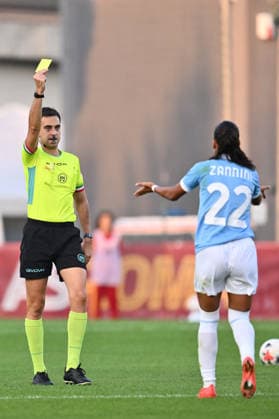 SOCCER - Women s Serie A - AS Roma vs. SS Lazio Women Photo by IPA ABACAPRESS.COM89266457 - Referee Flavio Barbetti cautions Carola Zannini of S.S. Lazio Women during the Serie A Women Athora match on Matchday 2 between A.S. Roman and S.S. Lazio Women at the Tre Fontane Stadium on October 3, 2026, in Rome, Italy. Rome Italy Copyright: xIPAxSport ABACAx
