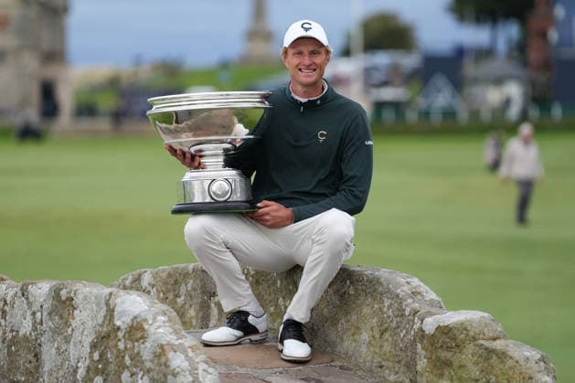 RECORD DATE NOT STATED 4th October 2026; Old Course at St Andrews, St Andrews, Scotland; DP World Tour Golf, Alfred Dunhill Links Championship, Final Day; Adrian Meronk holds the Alfred Dunhill trophy on the Swilcan Bridge after winning the tournament and becoming champion golfer AlecxBrown