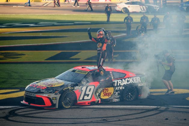 LAS VEGAS, NV - OCTOBER 04: Chase Briscoe ( 19 Joe Gibbs Racing Bass Pro Shops Toyota) climbs on his car to celebrate winning the race during the NASCAR, Motorsport, USA Cup Series Playoffs South Point 400 on October 04, 2026, at Las Vegas Motor Speedway in Las Vegas, NV. (Photo by Chris Williams LVMS Icon Sportswire) AUTO: OCT 04 NASCAR Cup Series Playoffs South Point 400 EDITORIAL USE ONLY Icon0072610041255