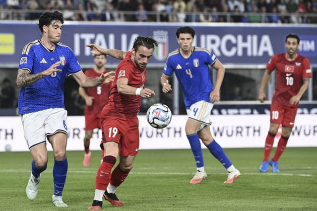 Italy v Turkiye - UEFA Nations League ?????? BOLOGNA, ITALY, OCTOBER 05: Yunus Akgun (R), of Turkiye, is challenged by Alessandro Bastoni (L), of Italy, during the UEFA Nations League Group A1 League phase football match between Italy and Turkiye at the Renato Dall’Ara stadium in Bologna, Italy, on October 05, 2026. Isabella Bonotto Anadolu Bologna Italy. Editorial use only. Please get in touch for any other usage. Copyright: x2026xAnadoluxIsabellaxBonottox