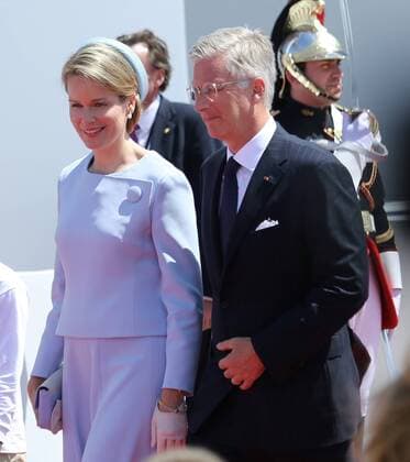 King Philippe and Queen Mathilde of Belgium arrive at Sword Beach in Ouistreham to attend the international ceremony commemorating the 70th anniversary of the D-Day landings in the Normandy region of France on June 6, 2014. OUI20140606722