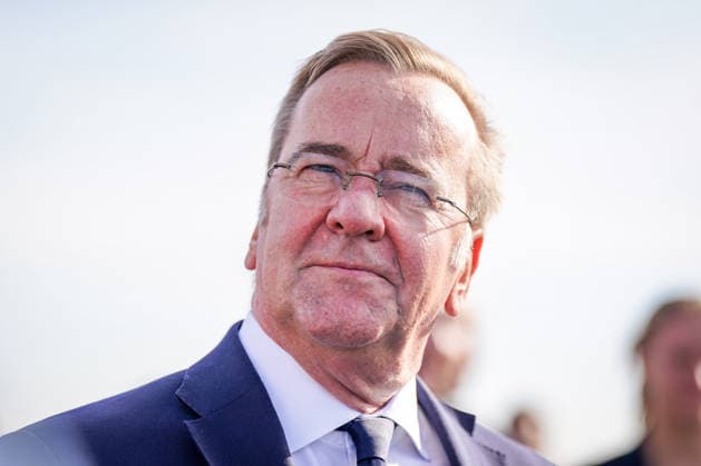 Germany, Emden: Federal Minister of Defense Boris Pistorius gazes into the distance during a press conference on the decision regarding the German Navy’s new naval base in Emden. Flags are visible in the background. Portrait, side profile, low-angle shot, Boris Pistorius, Federal Minister of Defense, Federa Copyright: xJOERANxSTEINSIEKx