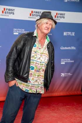 ABB FIRSTSTEPS: Detlev Buck appears on the red carpet at the 2026 FIRST STEPS Awards ceremony at the Theater des Westens on October 5, 2026, in Berlin, Germany