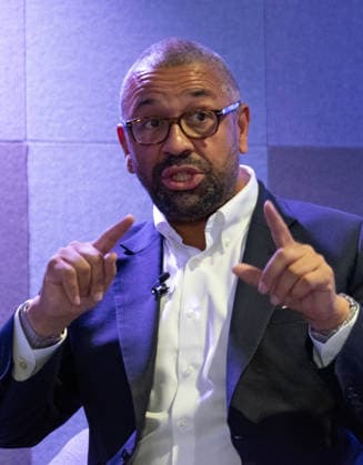 October 6, 2026, Birmingham, United Kingdom: Mayor candidate of London, Sir James Cleverly delivers a keynote policy speech on housing development and planning inside the auditorium at the Conservative Party Conference. Cleverly outlined proposals targeting homes affordability, brownfield regeneration, infrastructure zoning, and reforms to the London Plan. Birmingham United Kingdom - ZUMAs197 20261006_aaa_s197_055 Copyright: xGaryxRobertsx