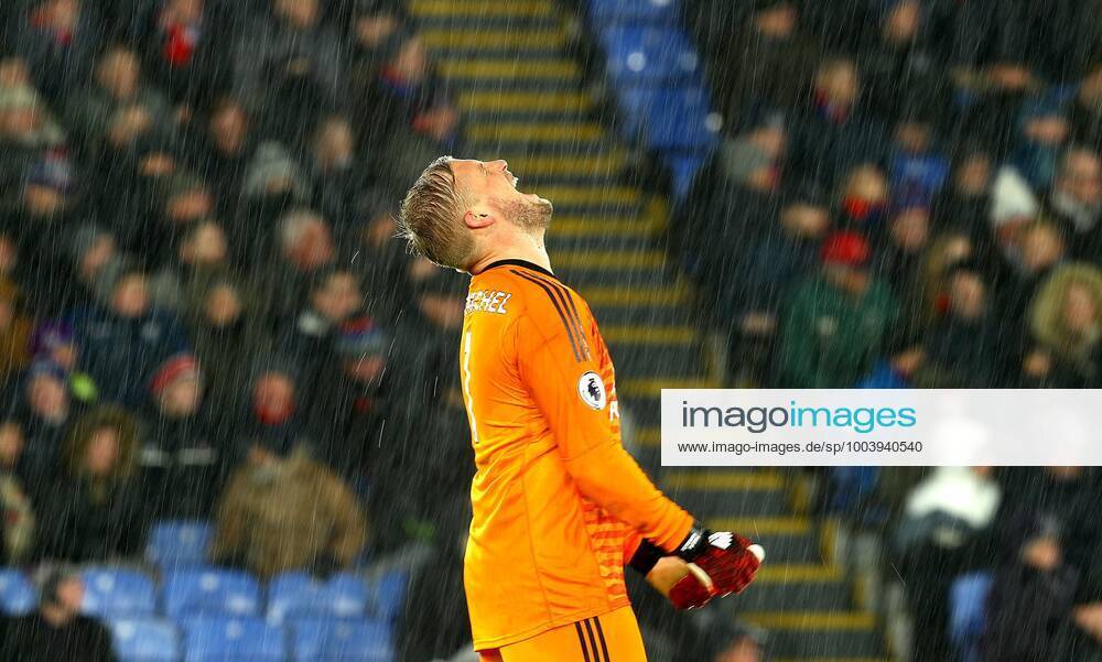 Mandatory Credit: Photo by Kieran McManus BPI Shutterstock (10034511cc) Kasper Schmeichel of Leicester shouts in frustration as heavy rain falls Crystal Palace v Leicester City, Premier League, Football, Selhurst Park, London, UK - 15 Dec 2018 No use with unauthorised audio, video, data, fixture lists (outside the EU), club league logos or live services. Online in-match use limited to 45 images (+15 in extra time). No use to emulate moving images. No use in betting, games or single club league player publications services. Crystal Palace v Leicester City, Premier League, Football, Selhurst Park, London, UK - 15 Dec 2018 No use with unauthorised audio, video, data, fixture lists (outside the EU), club league logos or live services. Online in-match use limited to 45 images (+15 in extra time). No use to emulate moving images. No use in betting, games or