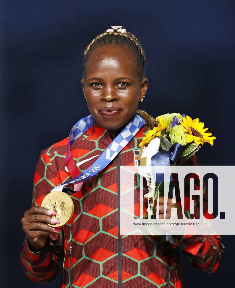 Tokyo Olympics: Athletics Peres Jepchirchir of Kenya poses with her Tokyo Olympic marathon gold medal at the victory ceremony held during the closing ceremony of the games at the National Stadium in Tokyo on Aug. 8, 2021. A14AA0000757513P