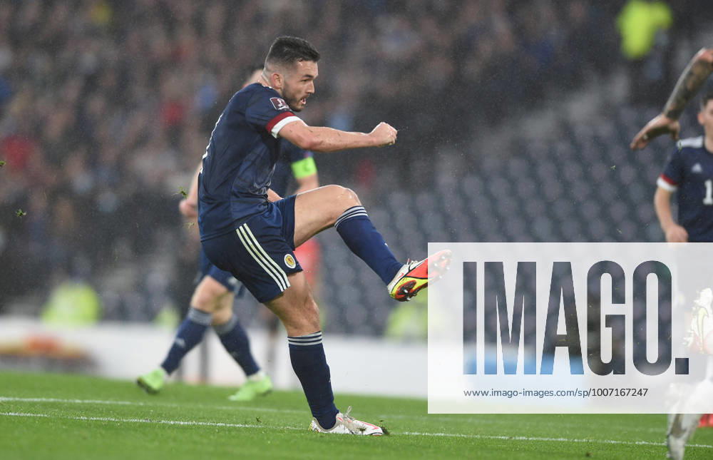 Glasgow, Scotland, 9th October 2021. John McGinn of Scotland scores Scotlands 1st goal during the FIFA World Cup, WM, Weltmeisterschaft, Fussball qualifiers match at Hampden Park, Glasgow. Picture credit should read: Neil Hanna Sportimage . SPI-1226-0013